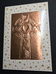 Embossed Celtic Cross in copper-colored alumi